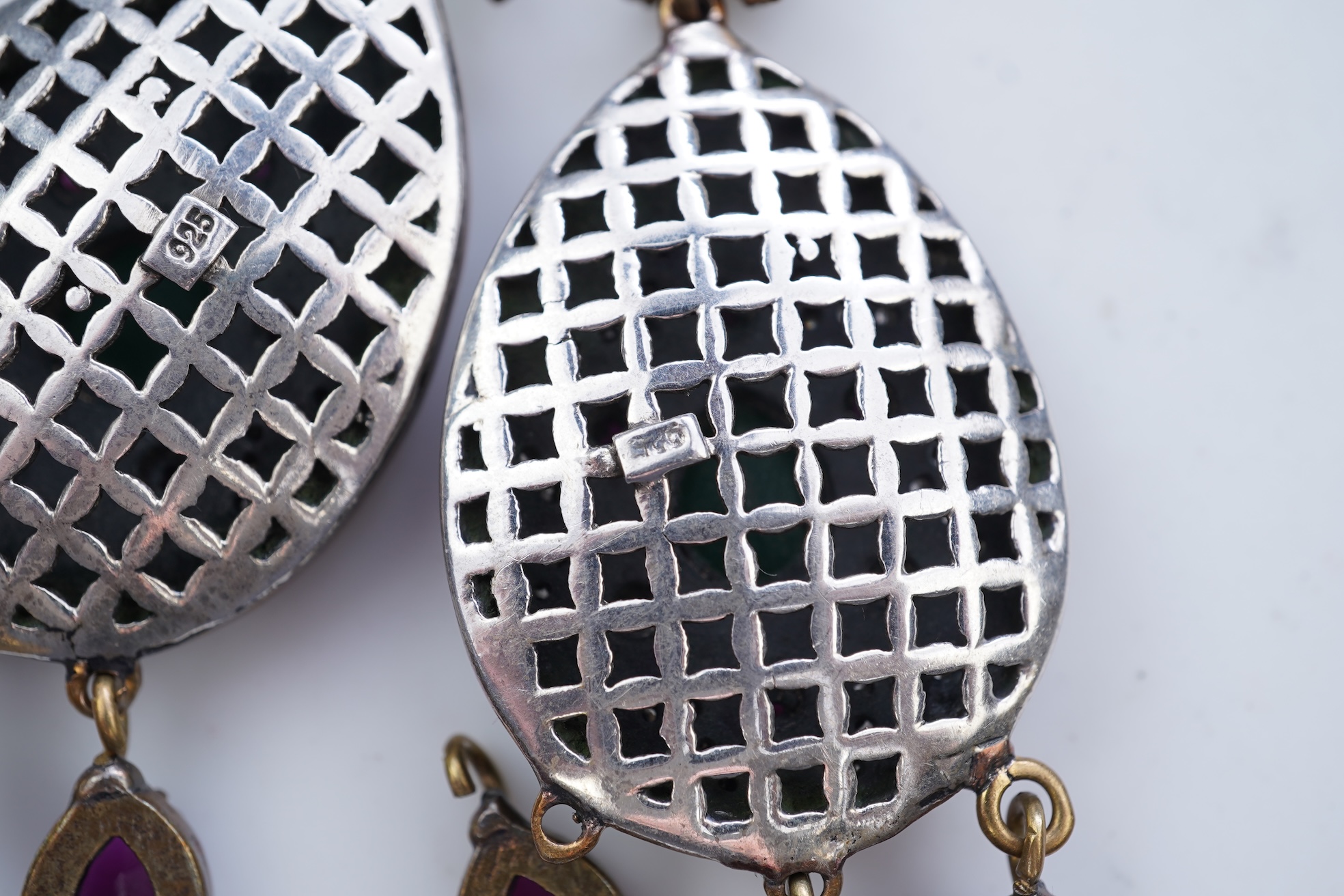 A pair of gem-set and diamond earrings